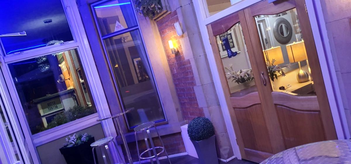 Main image: The Claremont The Claremont Hotel foyer lit in purple.