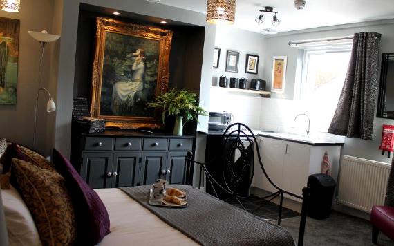 The Myriad Art Nouveau themed room with kitchen.