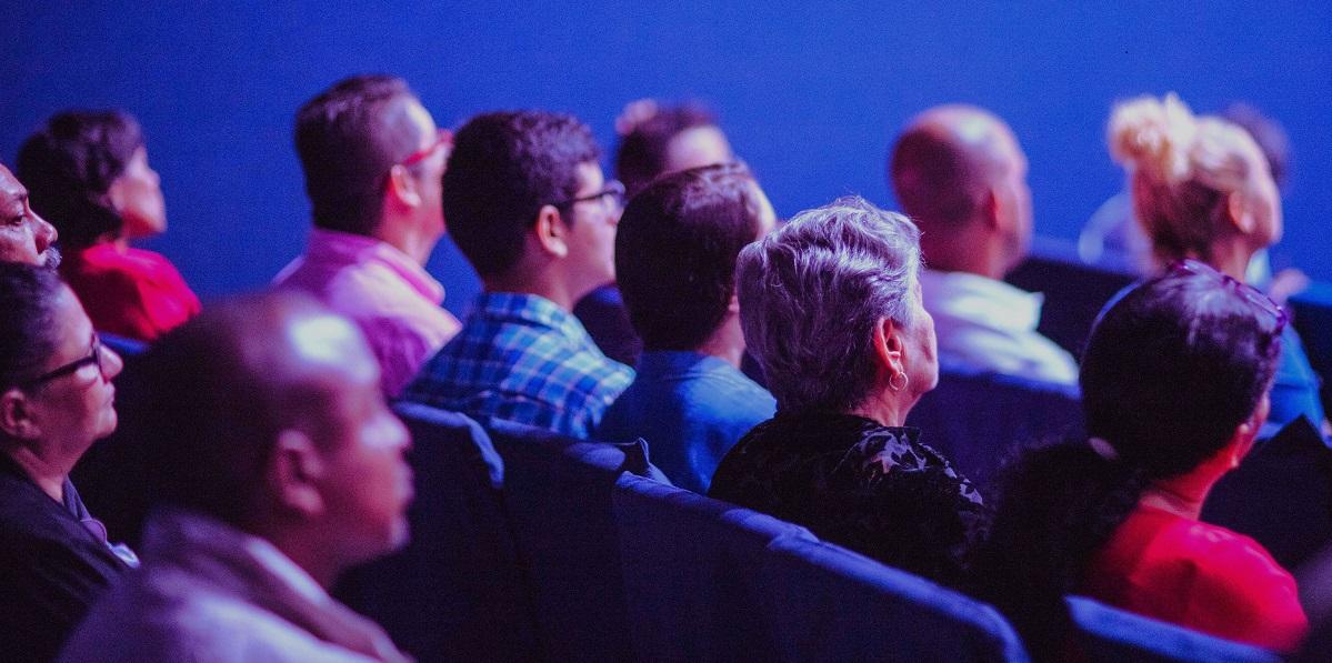 Group watching a film Group watching a film