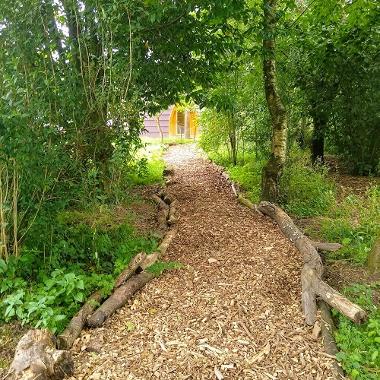 Path leading to camping pods