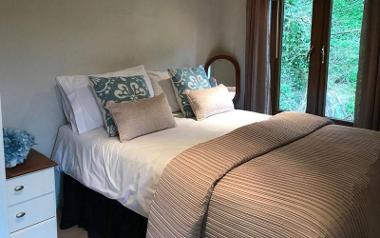 A bedroom inside a lodge at Bowland Lakes Leisure Village