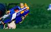 A close up of a person aiming a foam dart shooting Nerf Gun