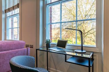 Close up of desk space overlooking Winckley Square Gardens