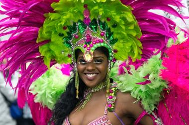 Lady in colourful carnival headdress at the Caribbean Carnival