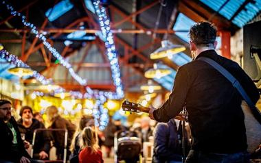 Live band playing to crowd. Image credit: Michael Porter