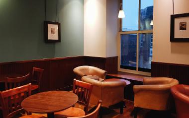 A view of the upstairs seating area inside Caffé Nero Fishergate