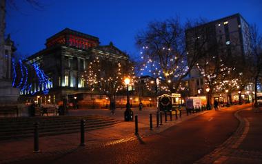 Christmas lights in the trees on the Flag Market and the Harris lit up for Christmas