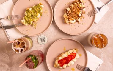 Three plates of waffle croissant hybrids, called croffles with fruit, ice cream and sauce toppings from Heavenly Desserts