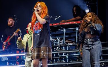 Sugababes performers singing on stage