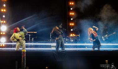 Sugababes performers singing on stage