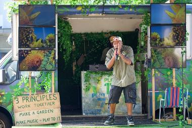 A man performing beat boxing on a microphone.