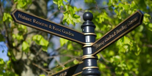 Signpost on Haslam Park. Signpost on Haslam Park, showing the way to various attractions within the park.