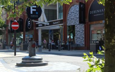 Entrance to Fishergate Shopping Centre and Starbucks along Fishergate high street.