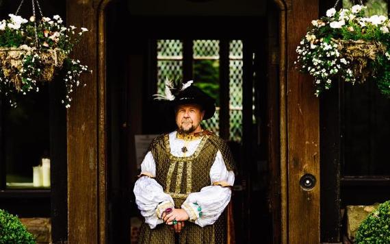 Simon Entwistle dressed as King Henry VIII as part of a guided tour.