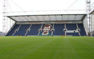 Deepdale Stadium football pitch and seating.