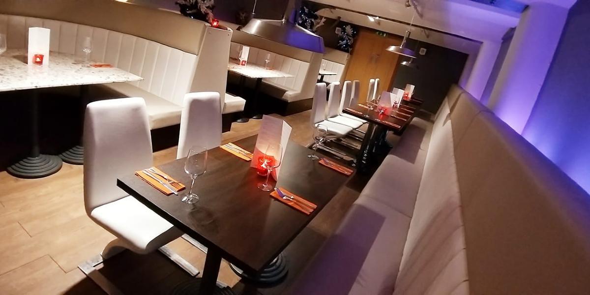 Main image: Booths and seating inside Moka Cafe Bar and Restaurant. Booths and seating inside Moka Cafe Bar and Restaurant.