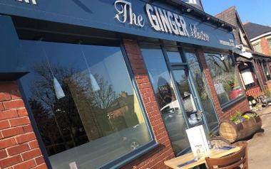 Outdoor seating at the Ginger Bistro on sunny day.