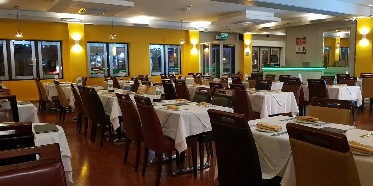Main image: Colourful dining area inside Sai Surbhi, Preston. Colourful dining area inside Sai Surbhi, Preston.