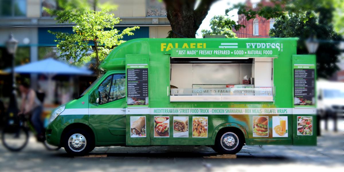 Main image: Falafel Express van parked on Preston Flag Market. Falafel Express van parked on Preston Flag Market.