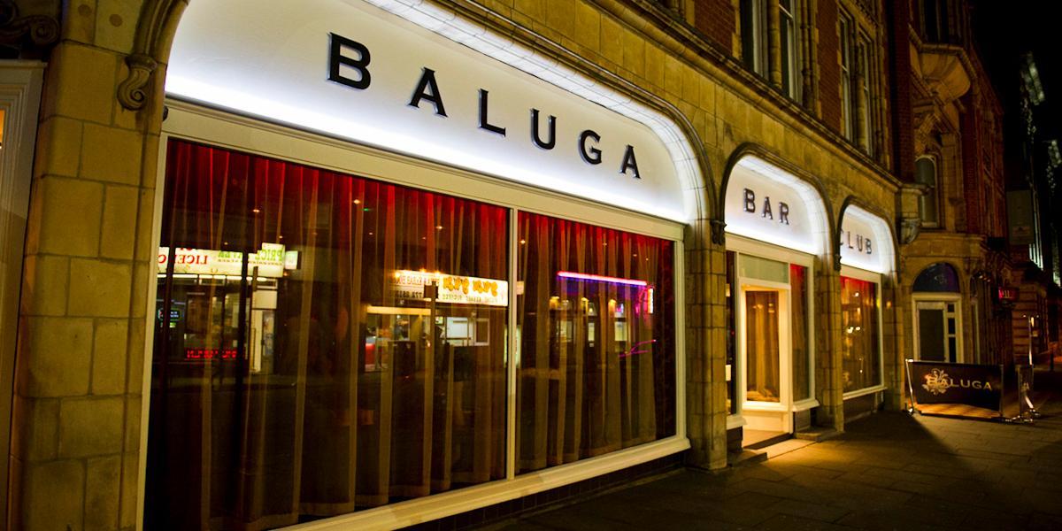 Main image: Baluga Bar and Club exterior at night. Baluga Bar and Club exterior at night.