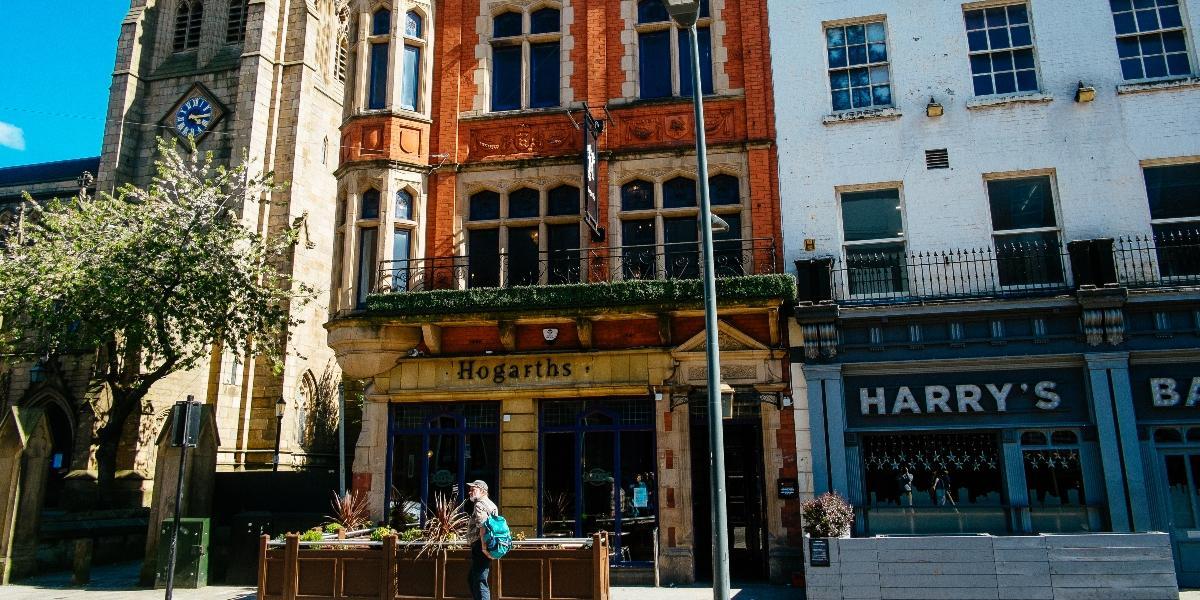 Main image: Hogarths' front entrance and outside seating on Church Street, Preston. Hogarths' front entrance and outside seating on Church Street, Preston.