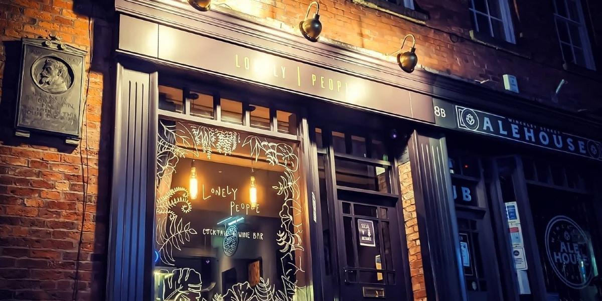 Main image: Outside Lonely People cocktail bar on Winckley Street. Outside Lonely People cocktail bar on Winckley Street.