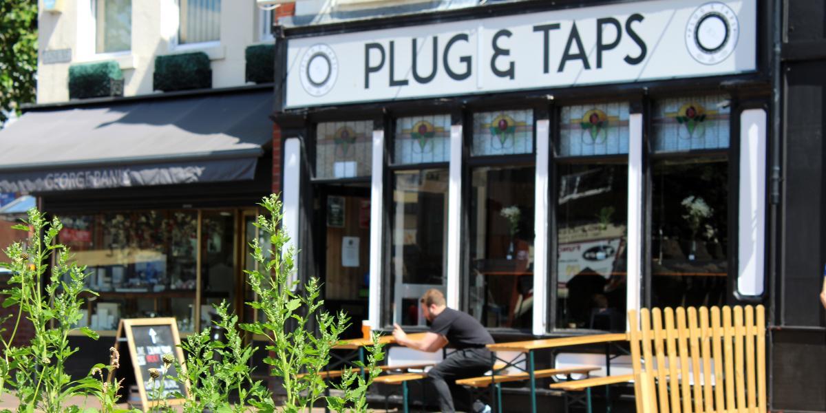 Outside Plug & Taps with outdoor seating.