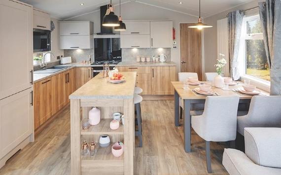 Kitchen and dining area inside caravan at Beacon Fell View Holiday Park.