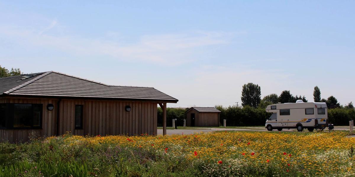 Donkey Creek Farm main building and caravan parked up. Donkey Creek Farm main building and caravan parked up.