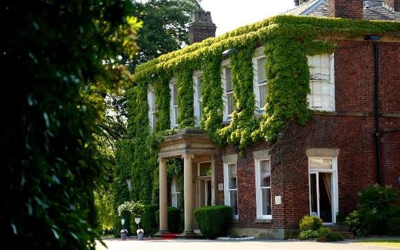 Farington Lodge front entrance, covered in ivy.