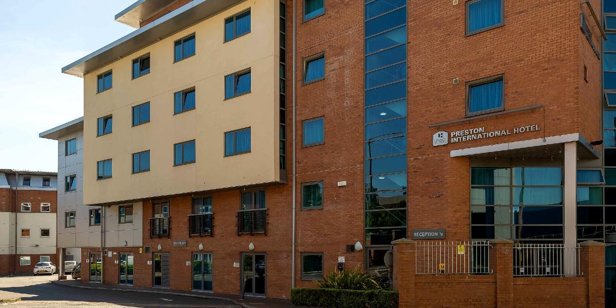 Main image: Exterior of Preston International Hotel. Exterior of Preston International Hotel.