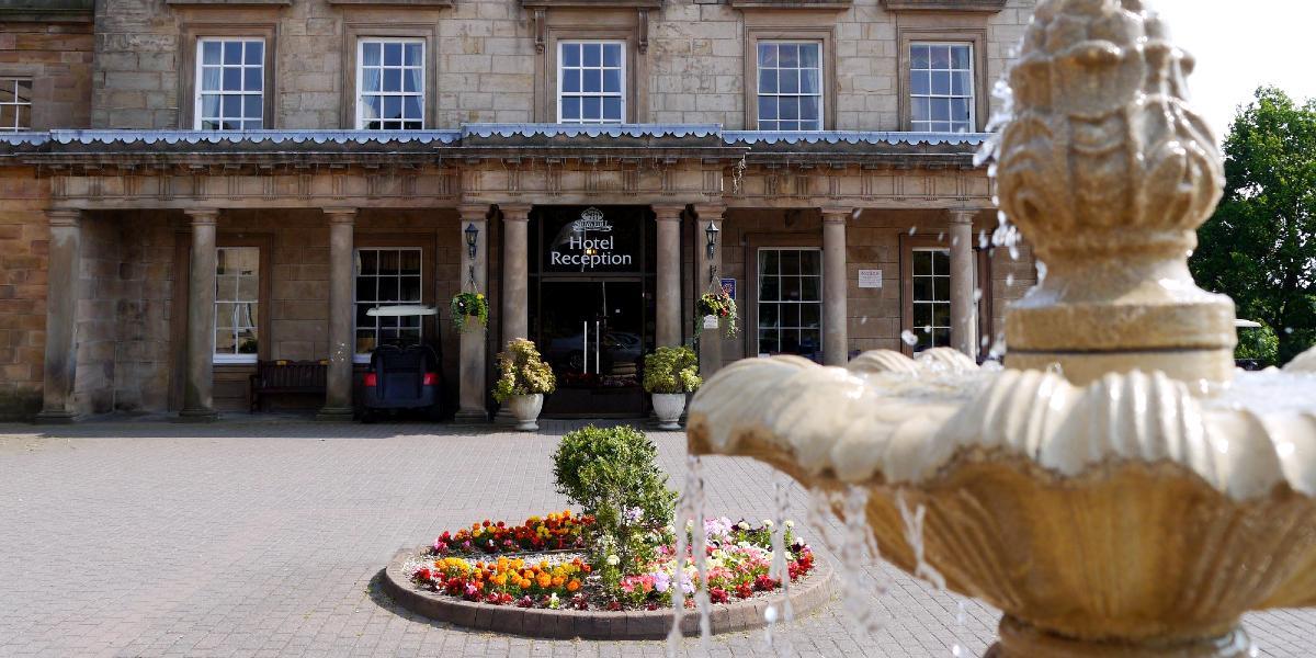 Main image: Entrance to Shaw Hill Hotel with fountain in foreground. Entrance to Shaw Hill Hotel with fountain in foreground.