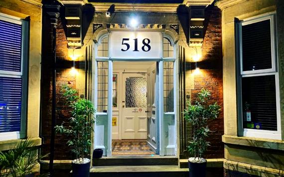 Front entrance to St Andrews House Hotel with door number 518.