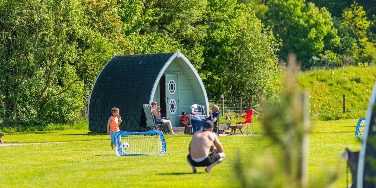 Main image: Array of different coloured camping pods at Stanley Villa Farm. Array of different coloured camping pods at Stanley Villa Farm.