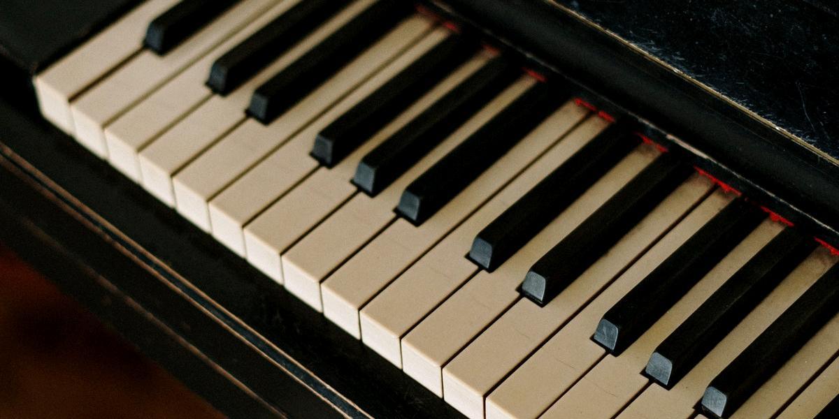 Main image Piano Meet Close up of piano keys.