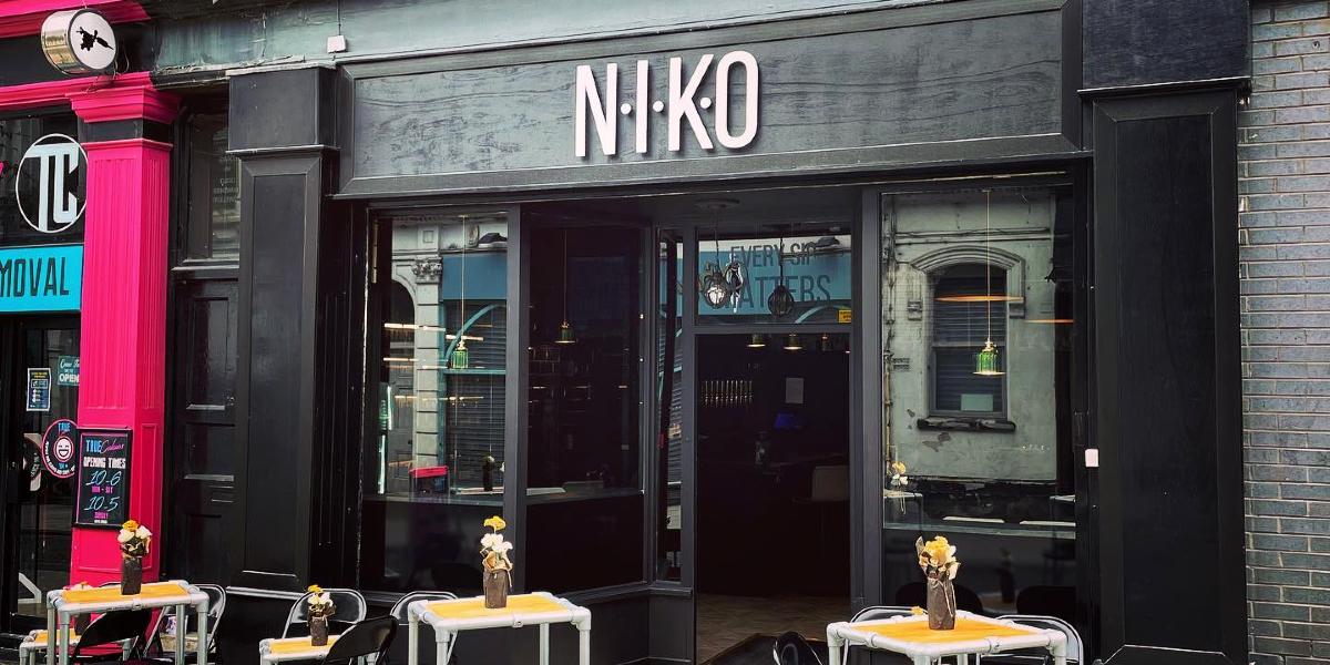 NIKO outside seating and bar front along Guildhall Street.