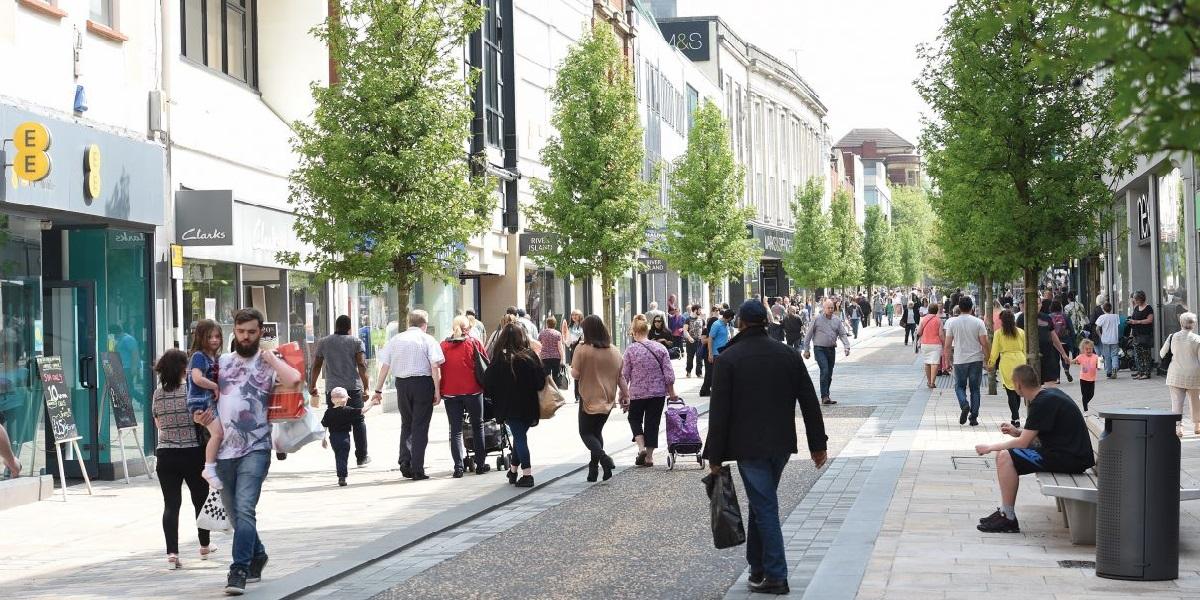 People walking down Fishergate High Street