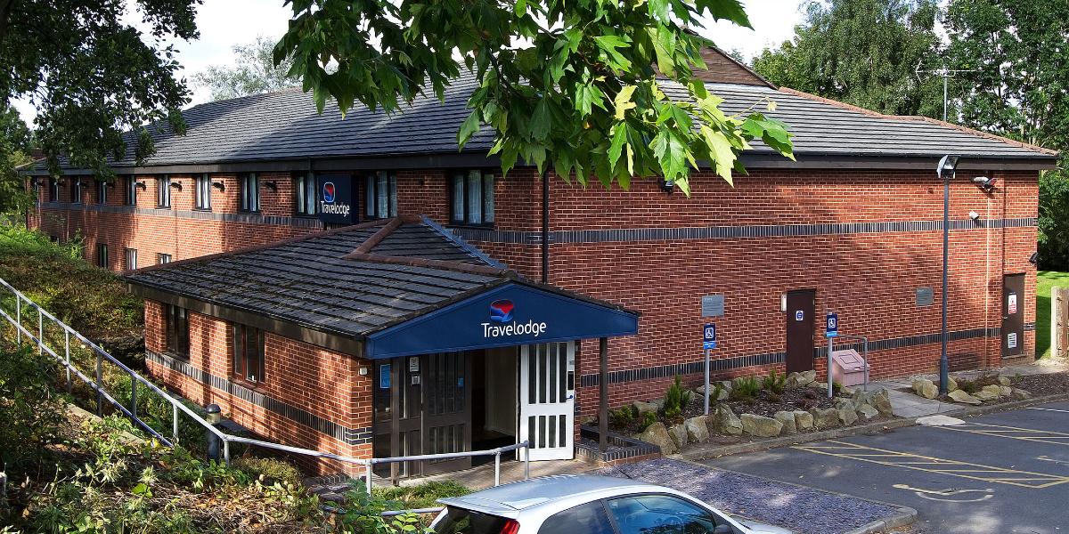 Main image: Exterior of Travelodge Preston Chorley hotel building. Exterior of Travelodge Preston Chorley hotel building.
