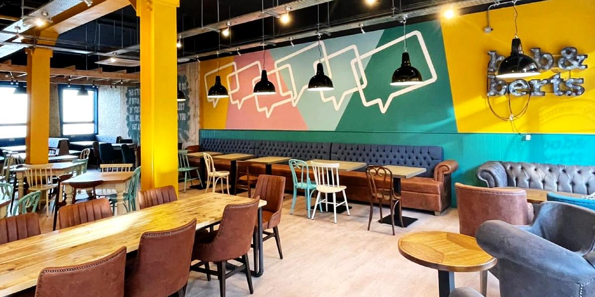 Seating and vibrant décor inside Bob & Berts Preston.