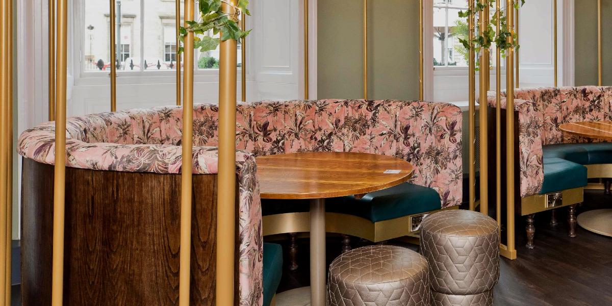 Main image: Bird cage booth inside Slug and Lettuce restaurant and bar. Bird cage booth inside Slug and Lettuce restaurant and bar.