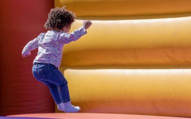 Child on bouncy castle at Rockprest.